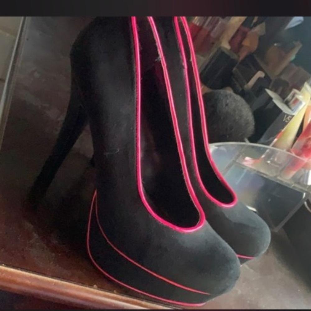 Black and hot pink high heels